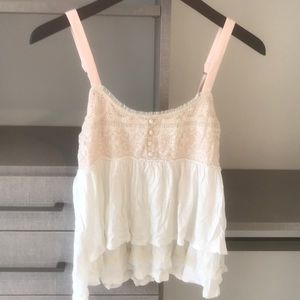 Pink and white frilly tank top with buttons